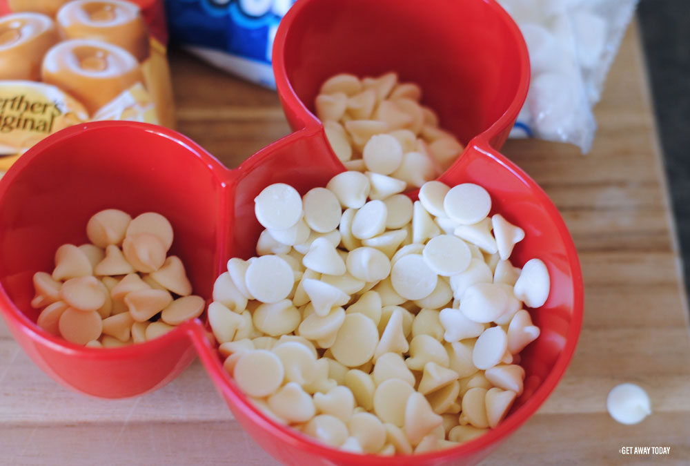 Hot Cocoa Marshmallow Macaron Tutorial white chocolate chips in red Mickey shaped bowl