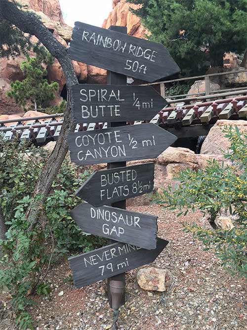 Big Thunder Mountain Railroad Western signs on attraction