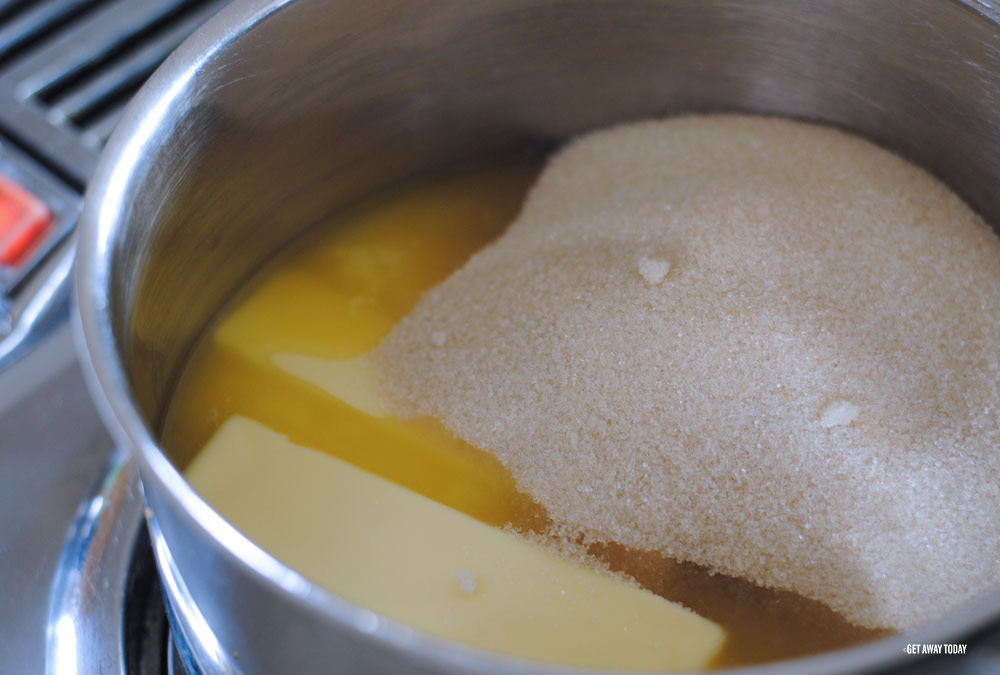 sticks of butter and sugar in pot