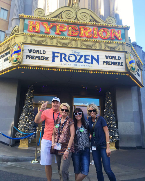 Group in front of Frozen Live at the Hyperion Sign