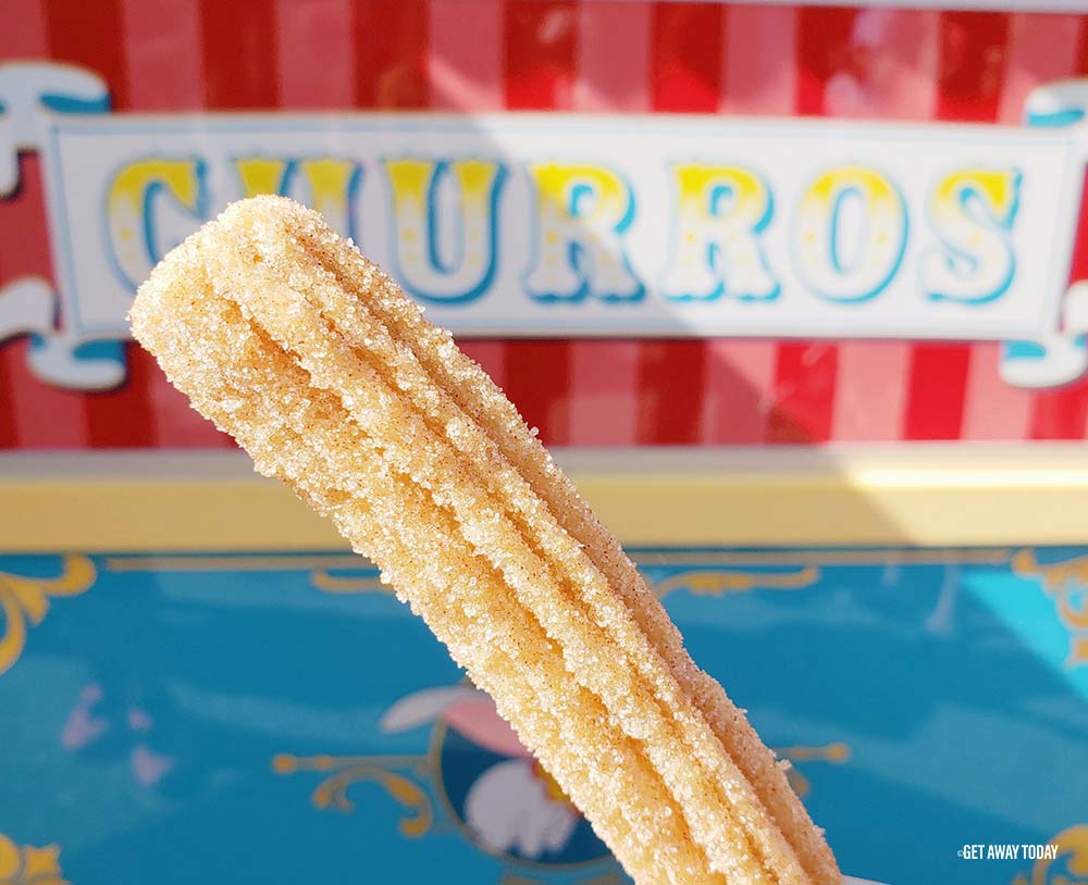 Churro in front of Churro Cart