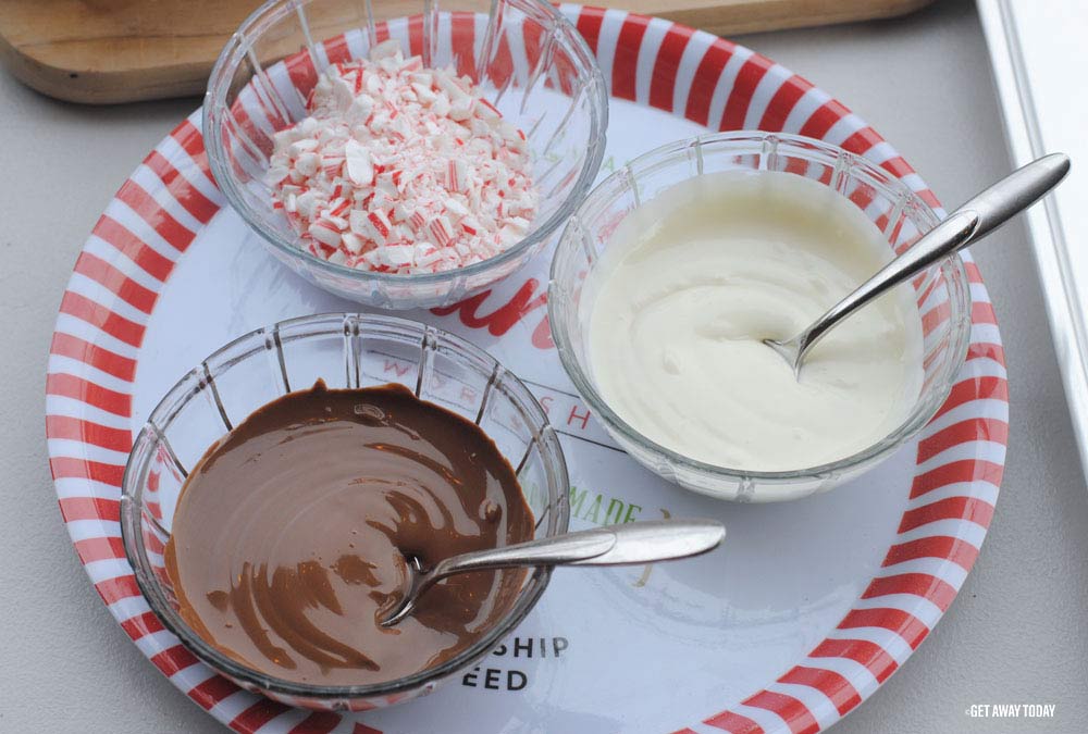 bowls of melted chocolate and crushed candycanes