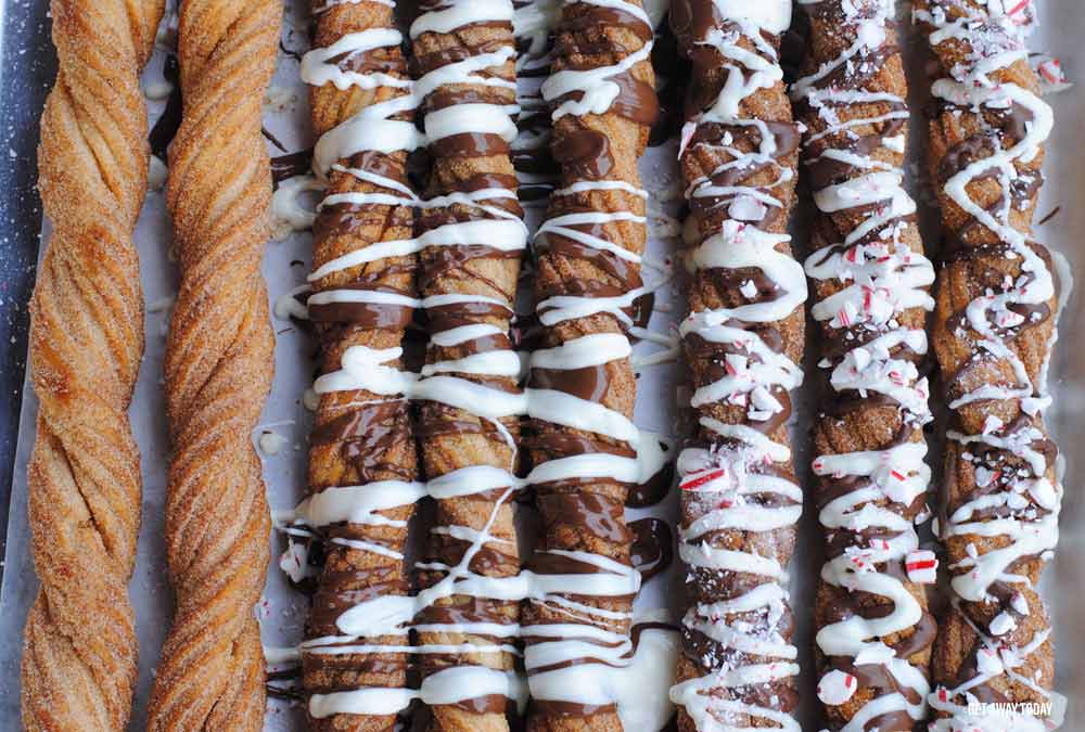 Toppings drizzled on churros close up