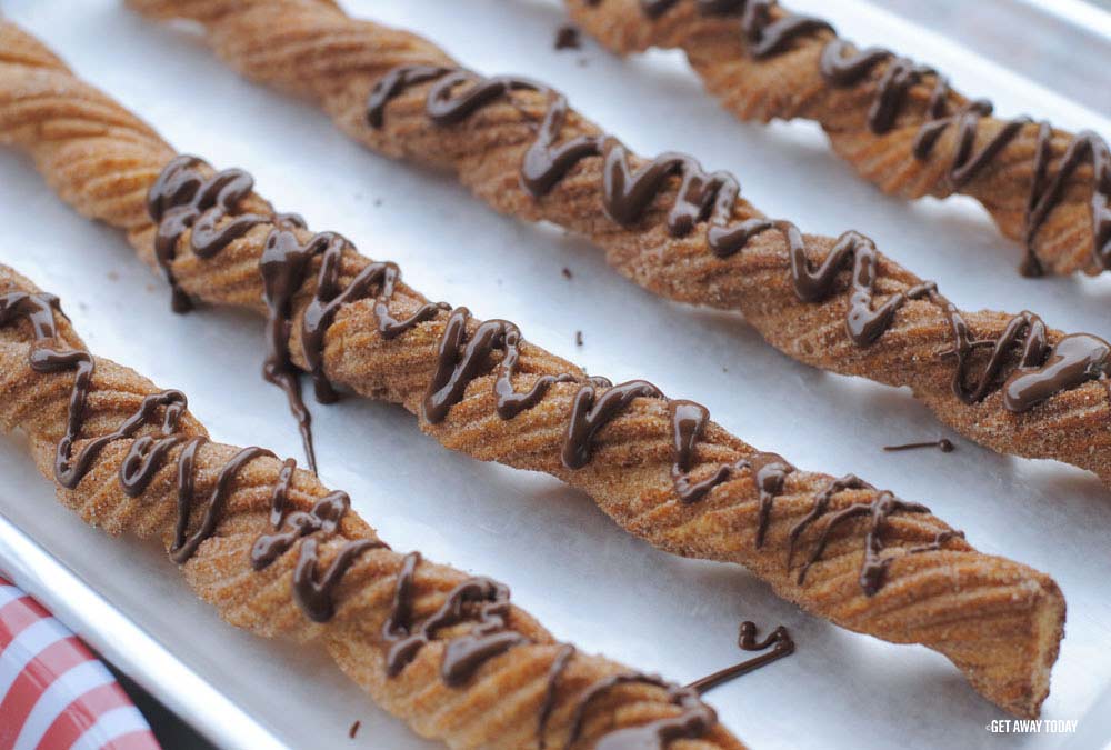 Churros with milk chocolate drizzle
