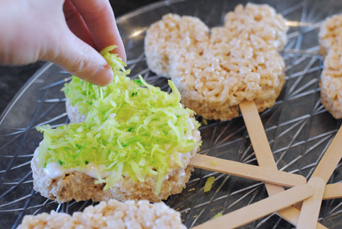 Mickey Treats - Make these cute and easy Mickey Spring Rice Krispy Treats for your family with our copycat Disneyland recipe. Your kids will love helping you make them. Get the how-to on the blog today: www.orsoshesays.com