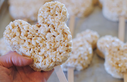 Mickey Treats - Make these cute and easy Mickey Spring Rice Krispy Treats for your family with our copycat Disneyland recipe. Your kids will love helping you make them. Get the how-to on the blog today: www.orsoshesays.com