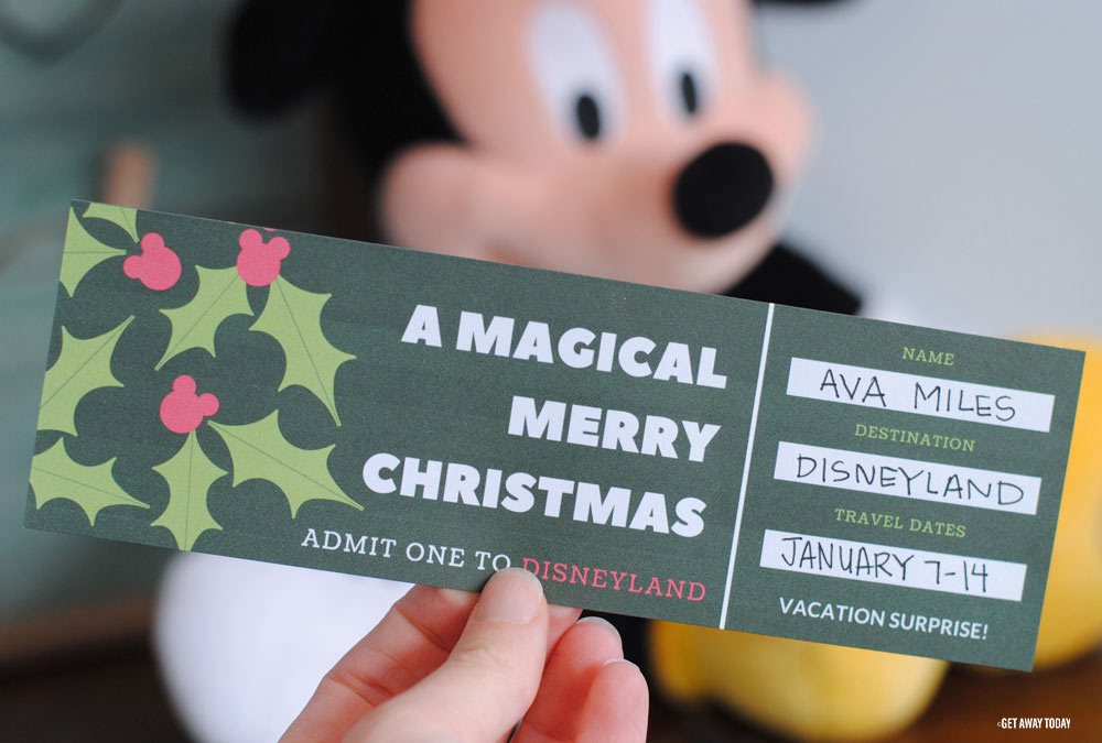 Disney ticket surprise printable with Mickey plush in background