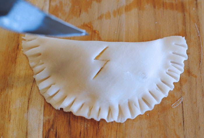 Harry Potter pumpkin pasties with lightning bolt in crust.