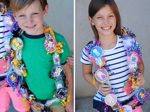 Kids wearing vacation necklaces